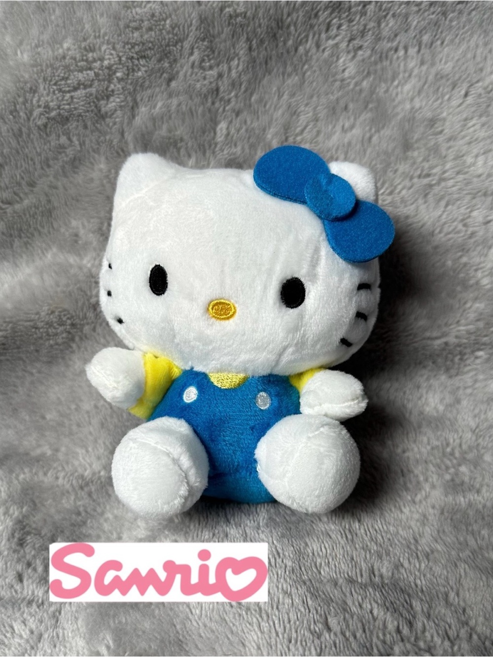 Hello Kitty wearing Blue Outfit